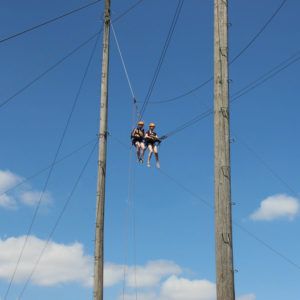 Two children on the King Swing at Frontier Centre 